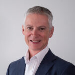 Headshot of Dr Michael Holland, Chief Executive